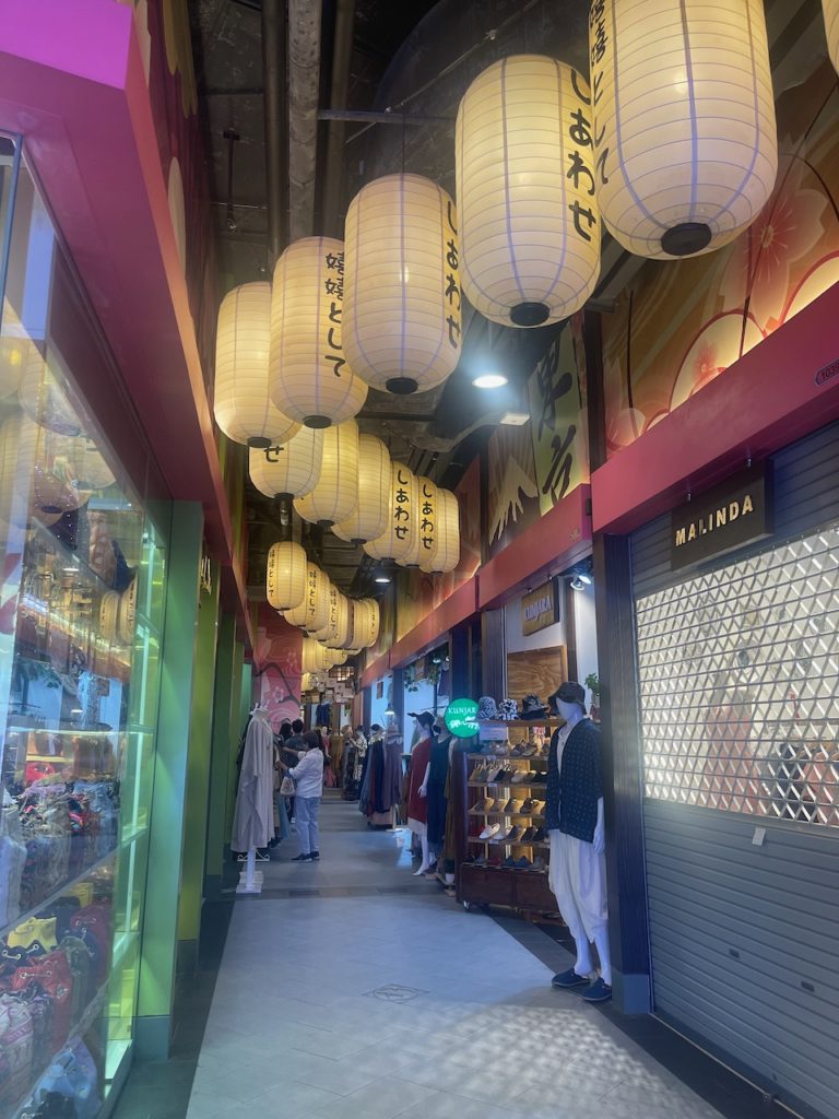 Lanterns inside of a shopping mall based on different travel destinations.