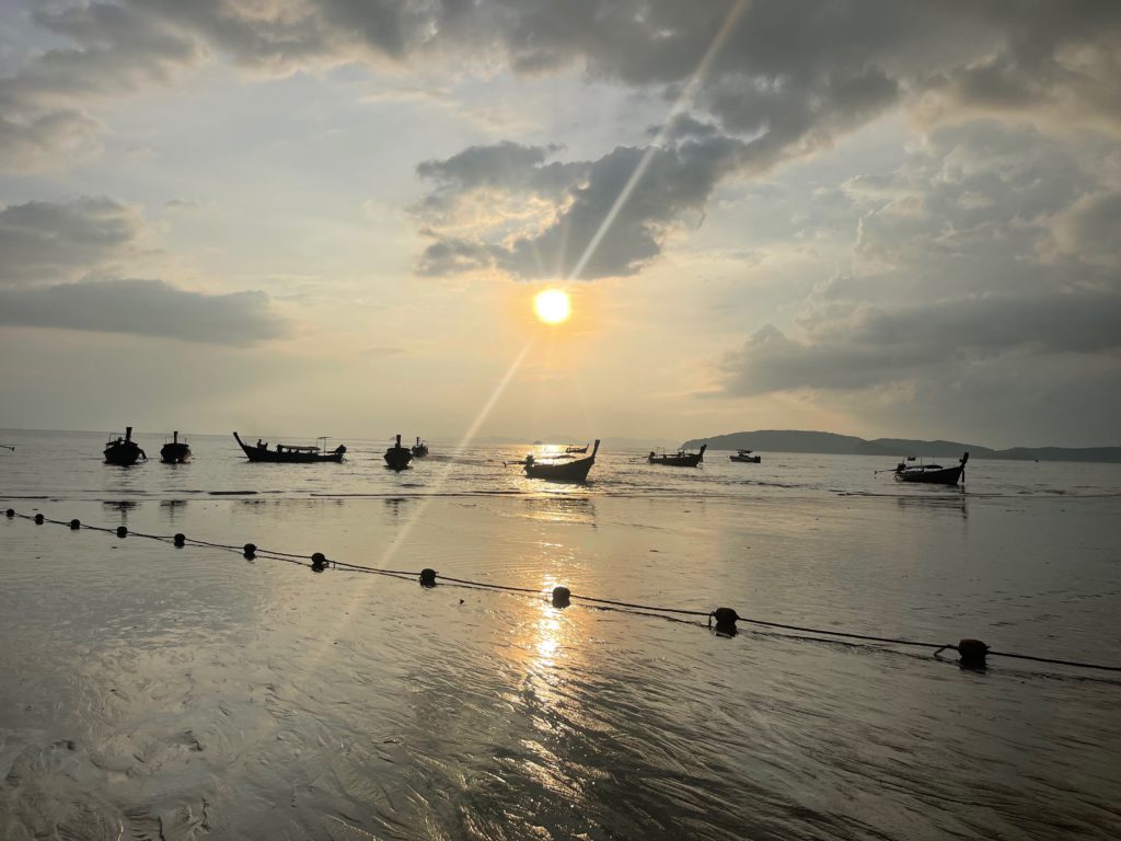 A sunset over Ao Nang Beach in Krabi