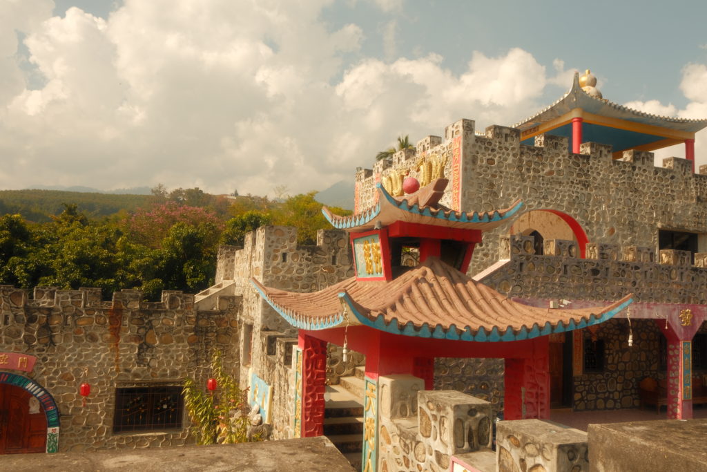 A replication of a Chinese village with castle walls.