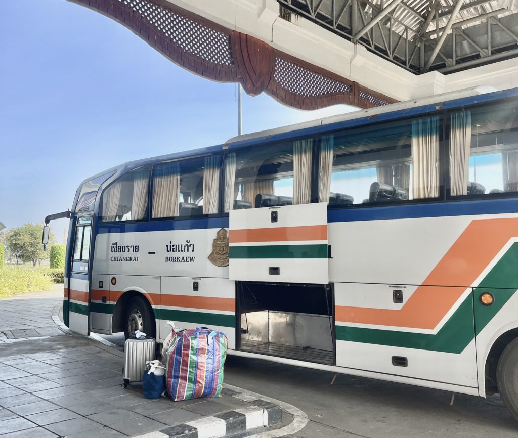 A white, orange and green coach.