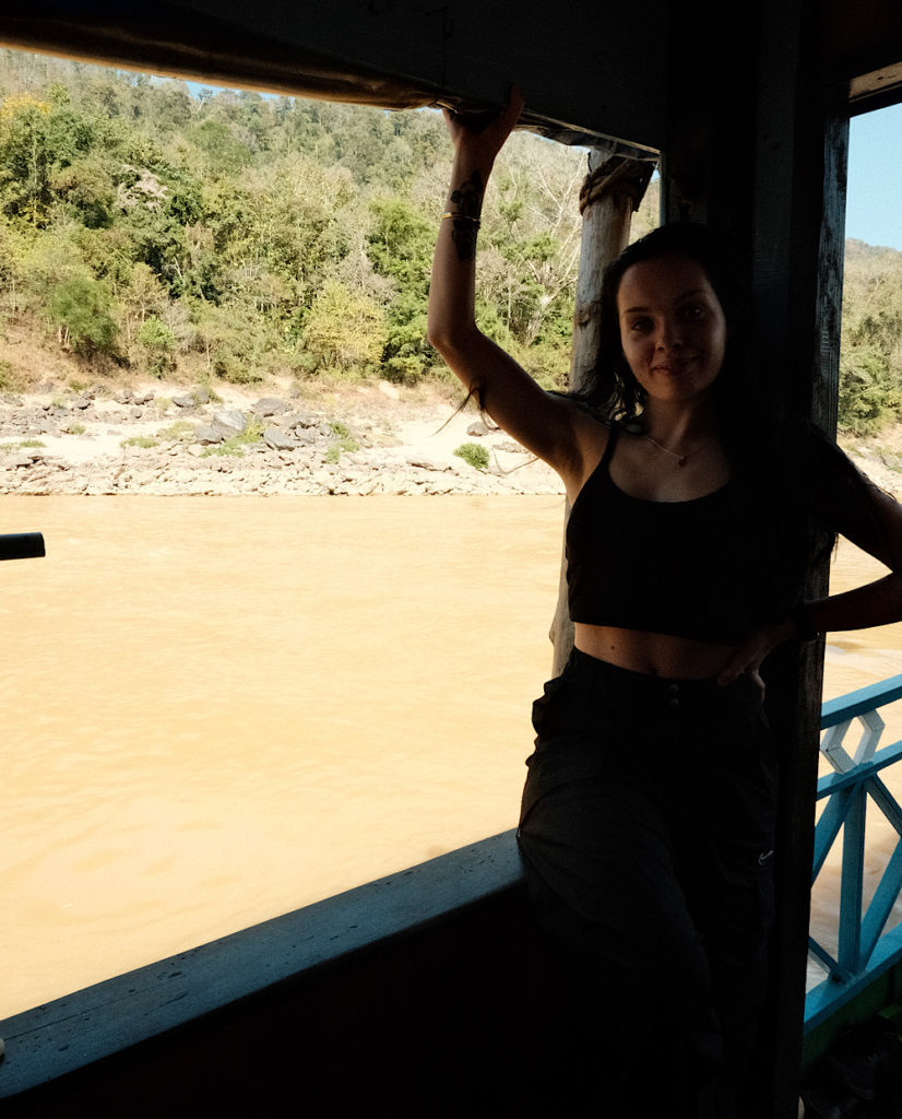 A woman on the slow boat to Luang Prabang on the Mekong River.
