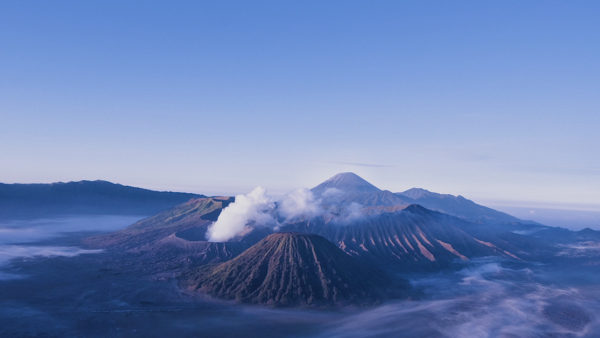 Mount Bromo at sunrise: A stunning volcanic landscape in Indonesia.